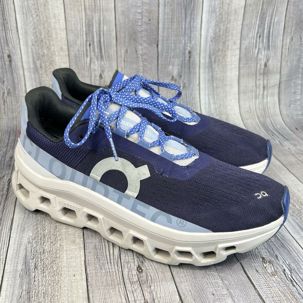 On Running Women's Navy Blue and White Cloud Monster Athletic Shoes